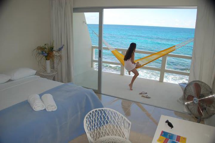 Guest room with king bed at Hotel Rocamar