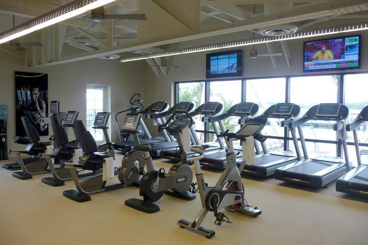 Fisher Island Club has a fitness center with flat-screen TVs