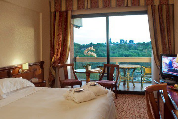 Superior double guest room at the Atahotel Villa Pamphili