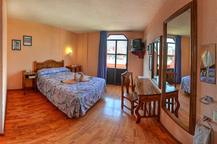 Habitación con una cama en San Ángel Puebla