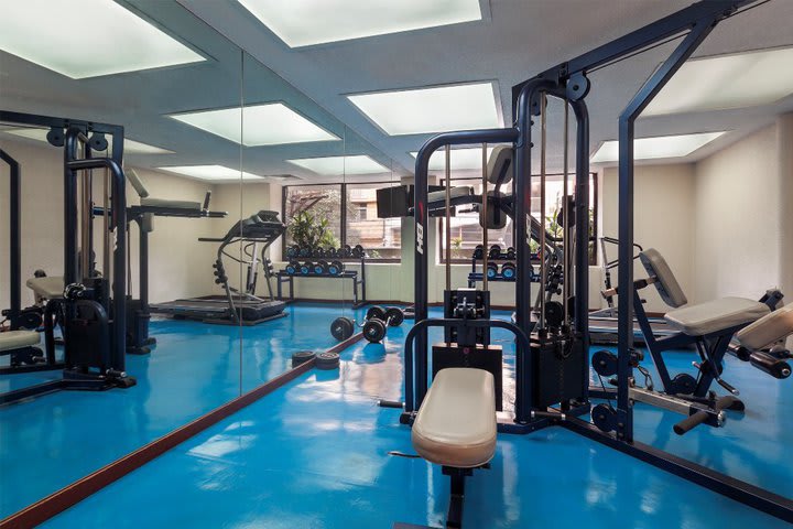 Fitness center with cardiovascular equipment and weights