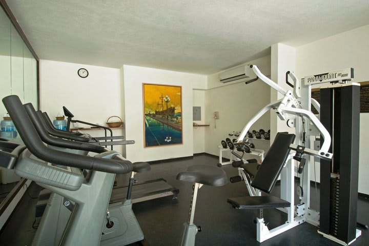 Fitness center with cardiovascular equipment and weights