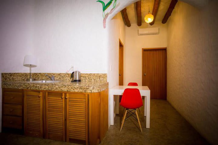 Table and amenities in a double guest room