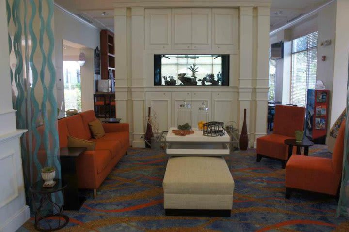 Sitting area in the lobby at the Hilton Garden Inn Orlando, hotel in front of SeaWorld®