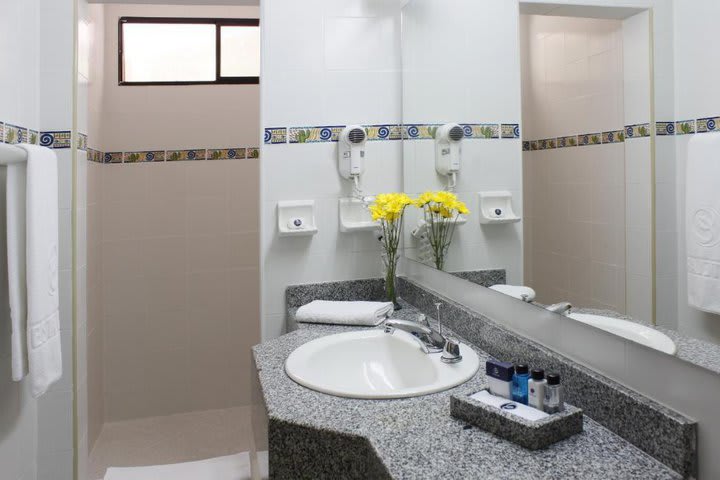 Baño privado de una habitación Bungalow