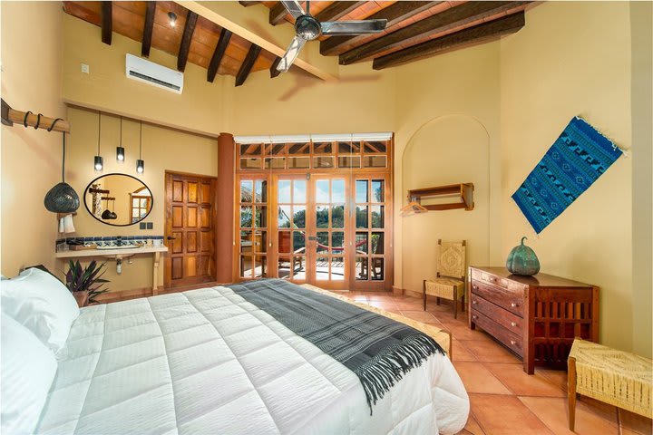 King guest room with oceanfront balcony