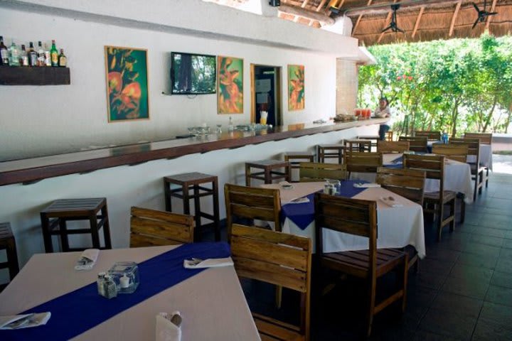 La Palapa restaurant at the Sotavento Hotel & Yacht Club serves international dishes