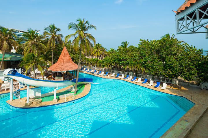 One of the pools has a slide