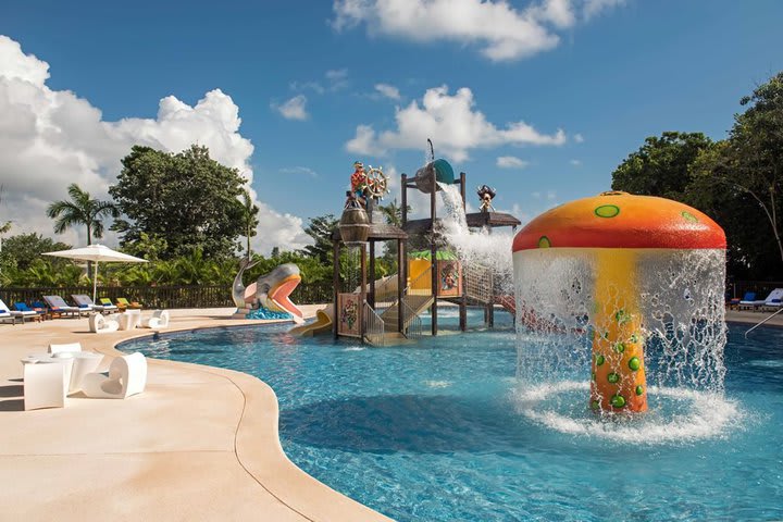 Pools are surrounded by children's playgrounds