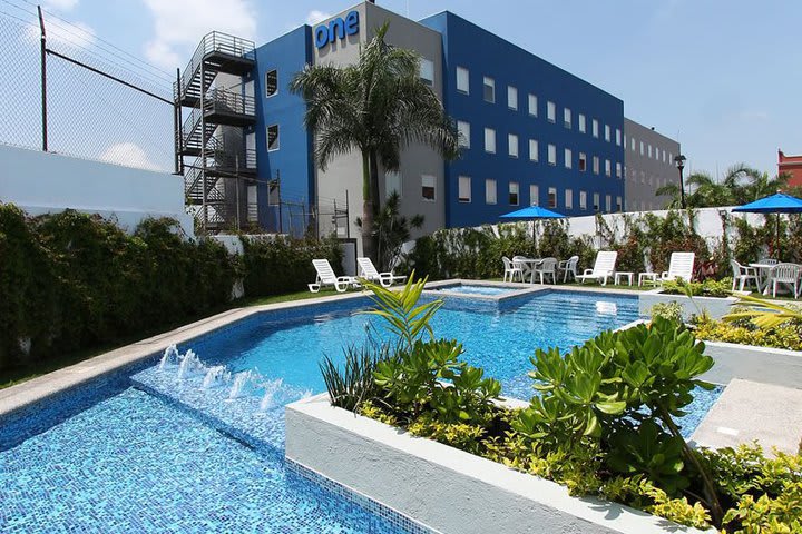 The hotel offers a sun terrace and a pool