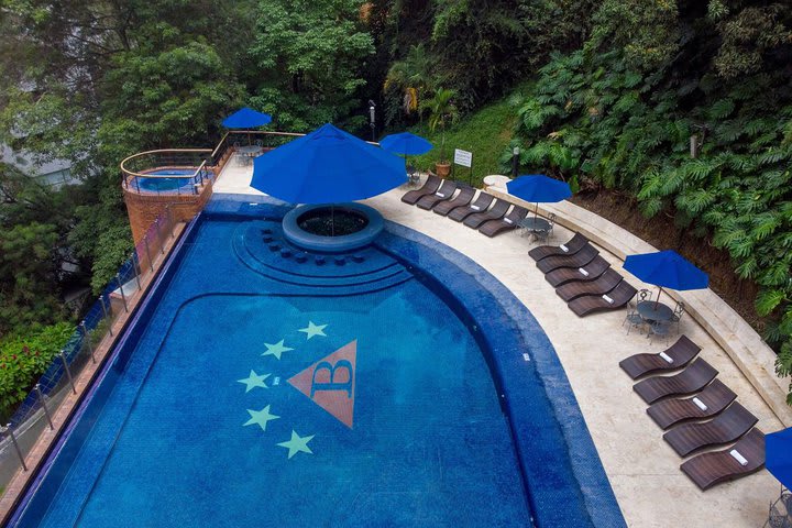 The hotel features a pool and Jacuzzi