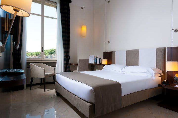 Guest room with exterior view at the Domus Mariae Palazzo Carpegna hotel in Rome