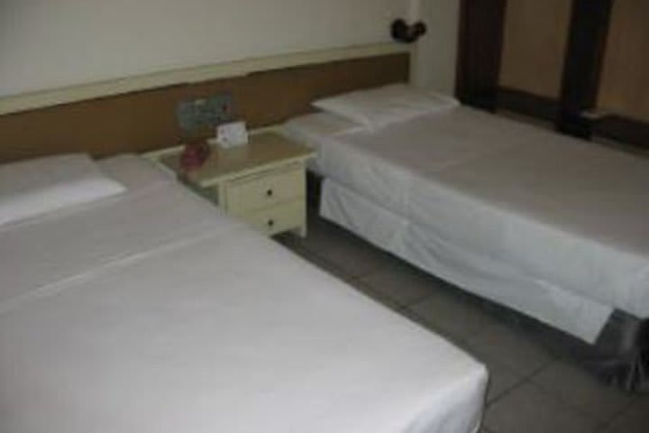 Guest room with two beds at the Plaza hotel in Manaus