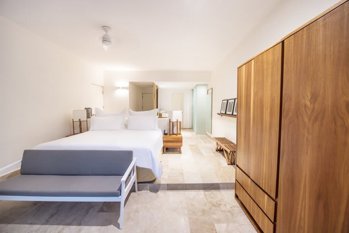 Guest rooms were designed in Mexican contemporary style