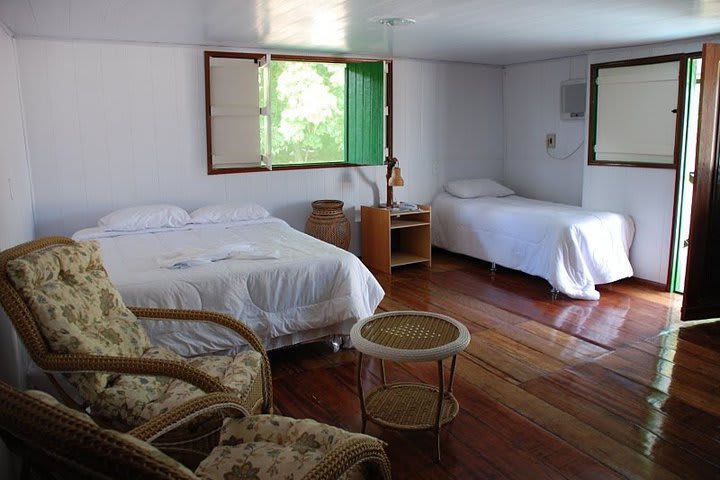 Guest room at the Amazon Geo hotel
