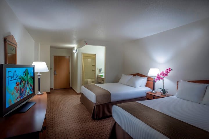 Guest rooms offer telephone and free local calls