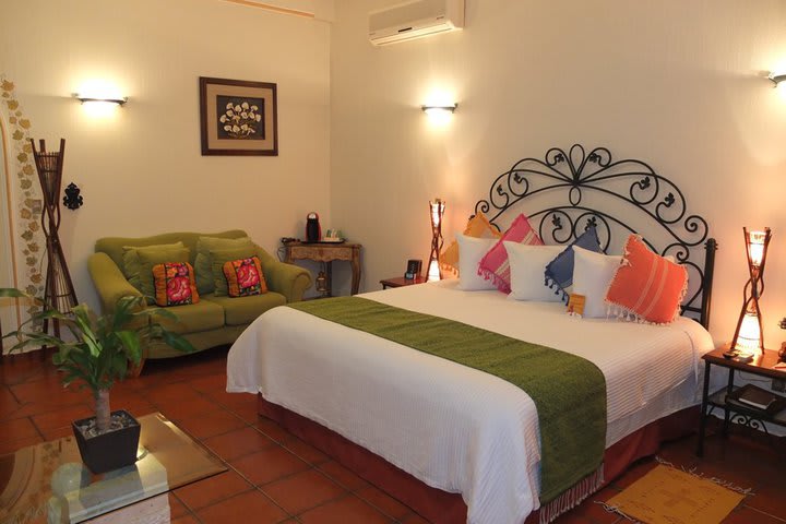 Guest rooms at Hotel Parador San Miguel have local crafts