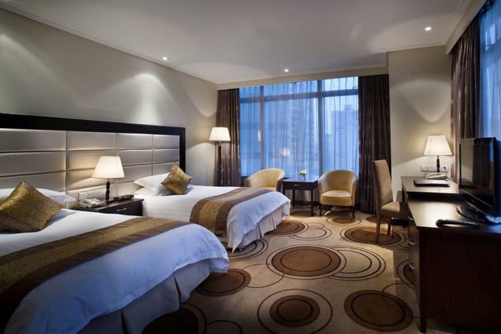 Superior guest room at the Xujiahui Park Hotel in Shanghai overlooking the city