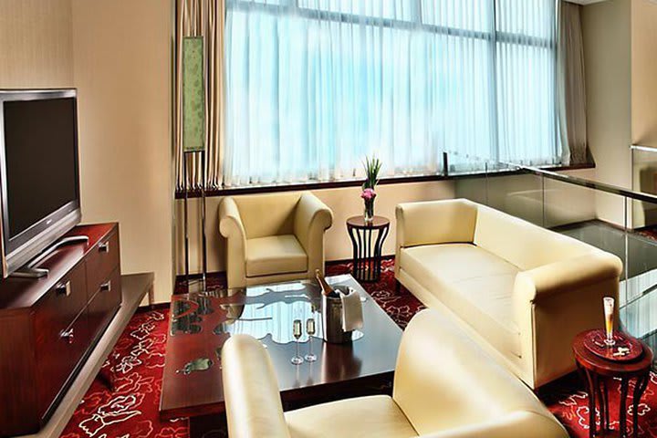 Sitting area in a suite at the Renaissance Shanghai Zhongshan Park Hotel