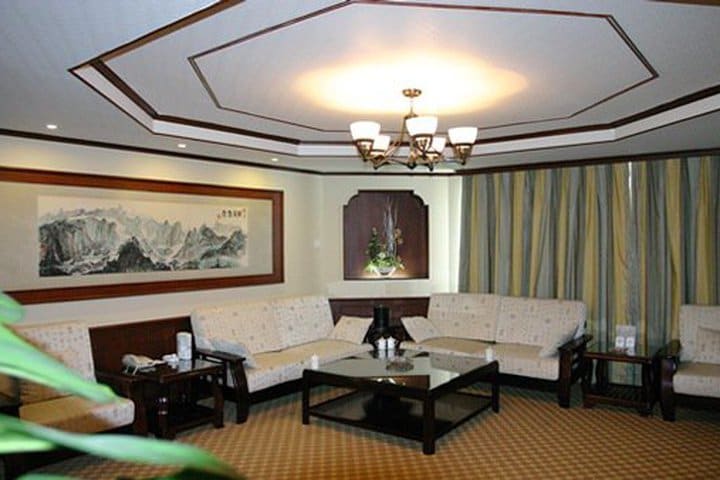 Sitting area in a deluxe suite at the Beijing North Star Continental Grand Hotel