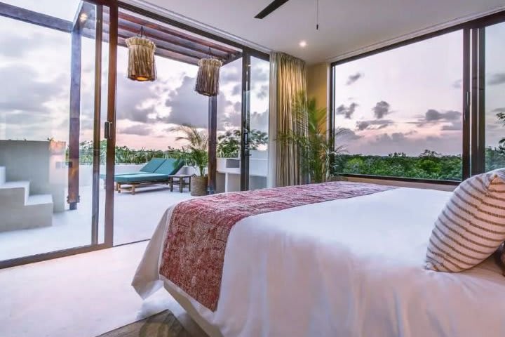 Bedroom in a rooftop suite with private pool