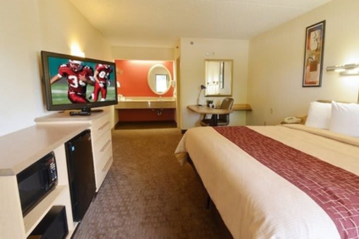 Guest room with minibar at the Red Roof Inn San Antonio Airport