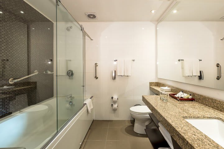 Private guest bathroom with tub