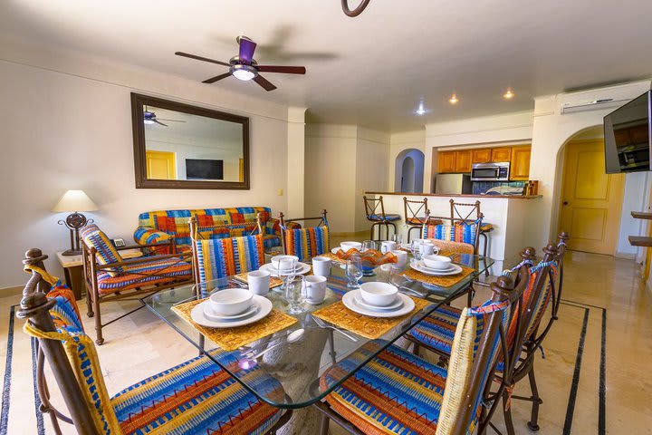 Dining and sitting area of a suite with two bedrooms