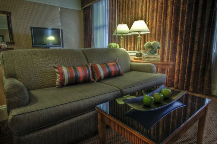 Guest room with sitting area at The Prescott hotel in San Francisco