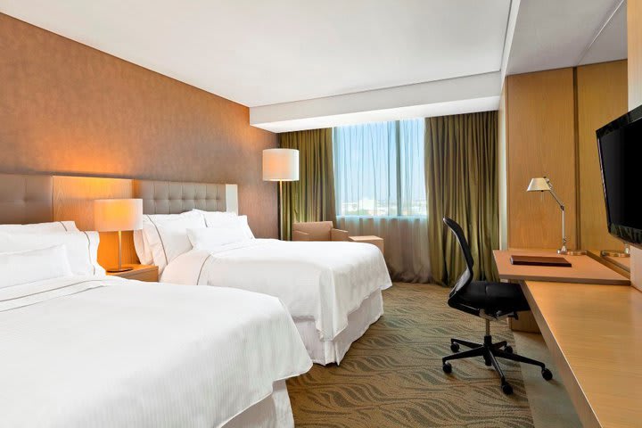 Guest rooms are equipped with a work desk