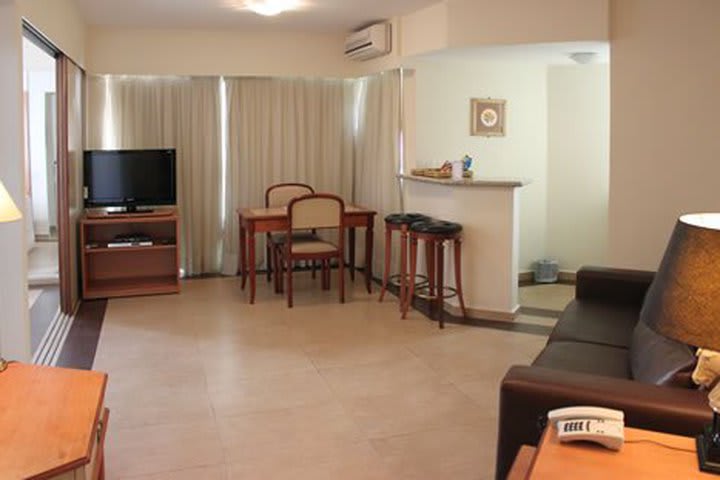 Guest rooms at the Flat Fortune Residence hotel in Sao Paulo offer a sitting area