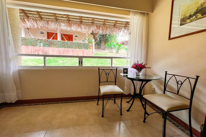 Table and chairs in a Terrace guest room