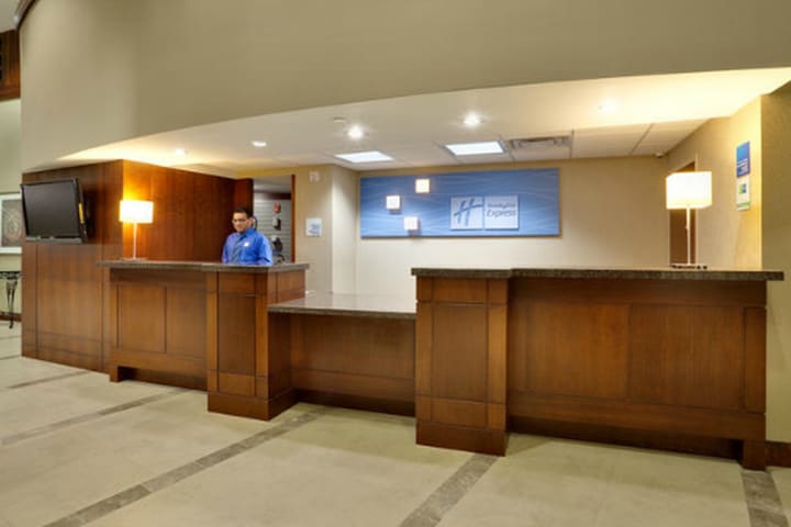 Front desk at the Holiday Inn Express Hotel Suites Toronto in Mississauga