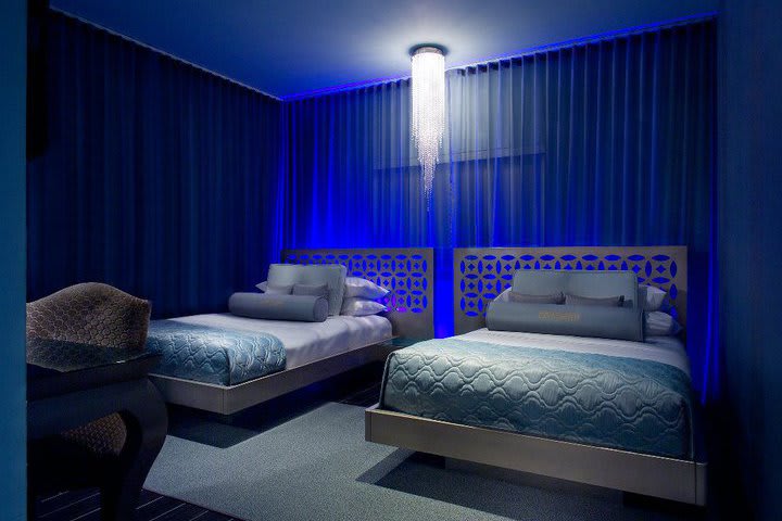 Guest rooms at Dream South Beach are decorated with blue light