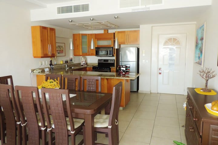 Dining area and kitchen in a suite