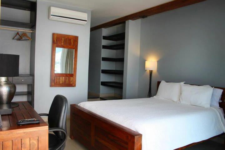 Guest room with queen size bed at the Shelter Bay, hotel in a marina at the Panama Canal