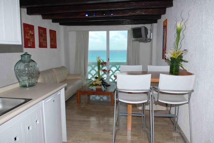 View of the sitting area in a suite from the kitchenette